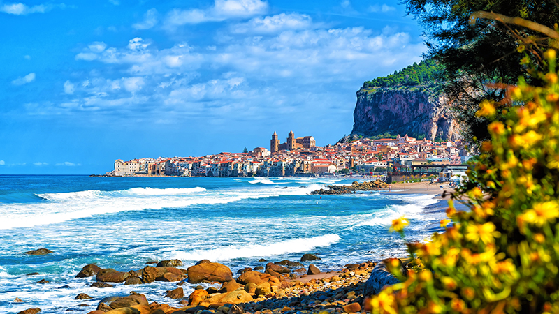 Landscape with beach and medieval Cefalu town, Sicily island, Italy